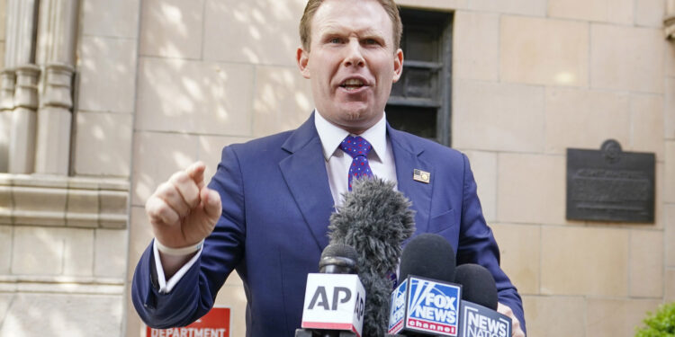 Andrew Giuliani, son of former New York Mayor Rudy Giuliani, speaks to reporters outside the building where his father lives, Wednesday, April 28, 2021, in New York. Federal agents raided Rudy Giulianiâ€™s Manhattan home and office on Wednesday, seizing computers and cellphones in a major escalation of the Justice Departmentâ€™s investigation into the business dealings of former President Donald Trumpâ€™s personal lawyer. (AP Photo/Mary Altaffer)