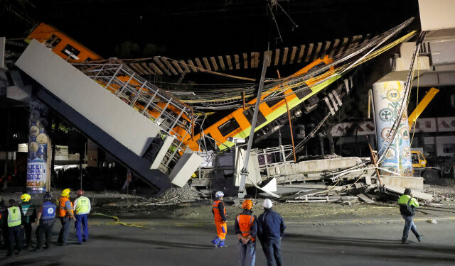 The site where an overpass for a metro partially collapsed with train cars on it is seen at Olivos station in Mexico City, Mexico May 4, 2021. REUTERS/Carlos Jasso