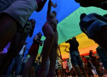 Revellers take part in the annual Gay Pride Parade in Sao Paulo, Brazil on May 04,2014. According to 3,5 million people were expected to take part in the parade. AFP PHOTO/Nelson ALMEIDA