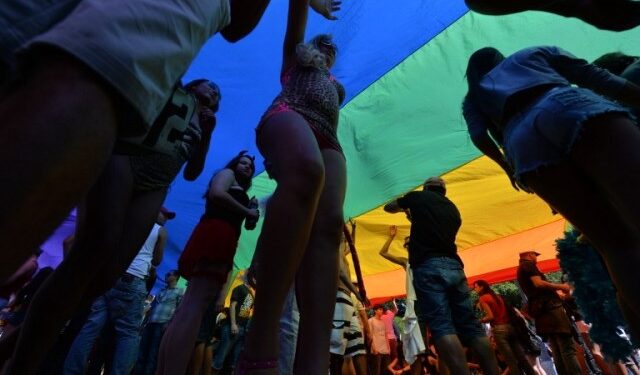 Revellers take part in the annual Gay Pride Parade in Sao Paulo, Brazil on May 04,2014. According to 3,5 million people were expected to take part in the parade. AFP PHOTO/Nelson ALMEIDA