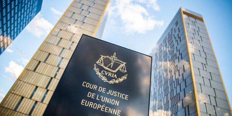 15 June 2019, Luxembourg, Luxemburg: The picture shows a sign in front of the office towers of the European Court of Justice with the inscription "Cour de Justice de l'union Européene" in the Europaviertel on the Kirchberg. Photo: Arne Immanuel Bänsch/dpa (Photo by Arne Immanuel Bänsch/picture alliance via Getty Images)