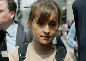 FILE - In this Monday, April 8, 2019, file photo, actress Allison Mack leaves Brooklyn federal court in New York. Mack, who played a key role in a scandal-ridden, cult-like upstate New York group, is facing sentencing Wednesday, June 30, 2021, after pleading guilty to charges she manipulated women into becoming sex slaves for the group’s spiritual leader. (AP Photo/Mark Lennihan, File)