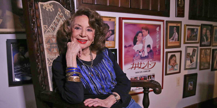 Writer Delia Fiallo, known as the Queen of Latin Soaps, posed at home in Coral Gables. She is celebrating her 90th birthday next July 4th,  on Thursday June 26, 2014.