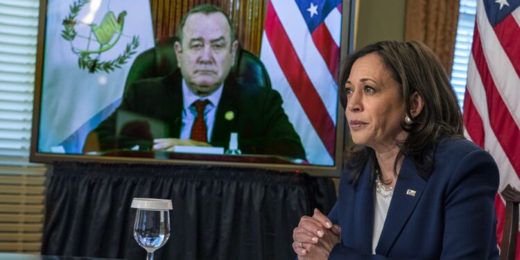 Vice President Kamala Harris meets virtually with Guatemala’s President Alejandro Giammattei, seen on screen at left, Monday, April 26, 2021, from her ceremonial office at the Eisenhower Executive Office Building on the White House complex in Washington. (AP Photo/Jacquelyn Martin)