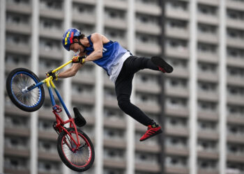 Venezuela's Daniel Dhers competes in the cycling BMX freestyle men's park seeding event at the Ariake Urban Sports Park during the Tokyo 2020 Olympic Games in Tokyo on July 31, 2021. (Photo by Lionel BONAVENTURE / AFP)