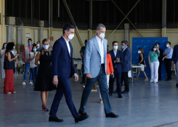 Spanish King Felipe VI and Spain's Prime Minister Pedro Sanchez during the visit to the reception center for Afghan refugees at the Torrejon de Ardoz air base in Madrid. August 28, 2021