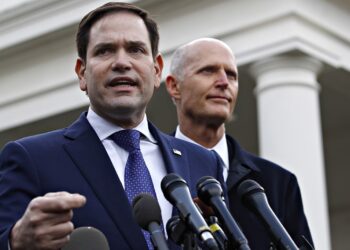 Sen. Marco Rubio, R-Fla., left, with Sen. Rick Scott, R-Fla., speaks to the media after their meeting with President Donald Trump about Venezuela, Tuesday, Jan. 22, 2019, at the White House in Washington. (AP Photo/Jacquelyn Martin)