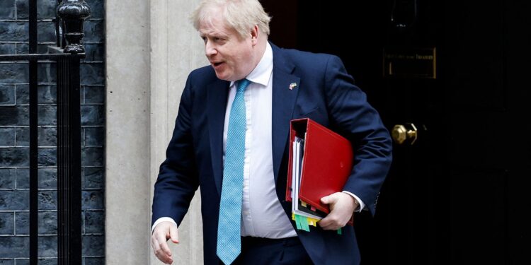 Britain's Prime Minister Boris Johnson leaves after attending the weekly Cabinet meeting at 10 Downing Street, in London, on March 23, 2022 in order to attend the Prime Minister's Questions (PMQ) session at the House of Commons. (Photo by Tolga Akmen / AFP) (Photo by TOLGA AKMEN/AFP via Getty Images)