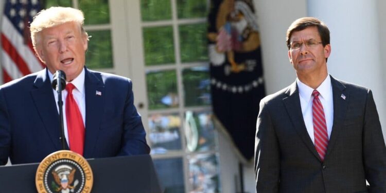(FILES) In this file photo taken on August 29, 2019 US Secretary of Defense Mark Esper listens as US President Donald Trump speaks during an event establishing the US Space Command in the Rose Garden of the White House in Washington, DC. - Donald Trump asked about the possibility of bombing drug trafficking labs in Mexico while he was US president, former defense secretary Mark Esper says in a book set to be released May 10, 2022. According to excerpts cited by the New York Times ON mAY 5, 2022, Trump believed the United States could pretend it wasn't responsible for launching missiles across its southern border, Esper, who was Pentagon head between July 2019 and November 2020, writes. (Photo by SAUL LOEB / AFP)