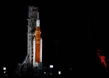 NASA's new moon rocket sits on Launch Pad 39-B hours before liftoff Monday, Aug. 29, 2022, in Cape Canaveral, Fla. This is scheduled to be the first flight of NASA's 21st-century moon-exploration program, named Artemis after Apollo's mythological twin sister. (AP Photo/Chris O'Meara)