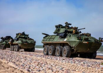 U.S. Marines with Battalion Landing Team 2/6, 22nd Marine Expeditionary Unit, prepare to board a landing craft, air cushion in light armored vehicles during BALTOPS 22 in Ventspils, Latvia, June 12, 2022. BALTOPS 22 is the premier maritime-focused exercise in the Baltic Region. The exercise, led by U.S. Naval forces Europe-Africa, and executed by Naval Striking and Support Forces NATO, provides a unique training opportunity to strengthen combined response capabilities critical to preserving freedom of navigation and security in the Baltic Sea. (U.S. Marine Corps photo by Sgt. Armando Elizalde)