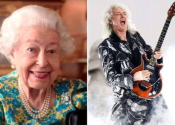 La reina Isabel II (+) y el guitarrista de Queen, Brian May. Foto de archivo.