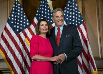 FILE Ñ House Speaker Nancy Pelosi (D-Calif.) with her husband, Paul Pelosi, during the ceremonial swearing-in of the 116th Congress in the Rayburn Room of the U.S. Capitol in Washington, Jan. 3, 2019. Paul Pelosi was hospitalized after he was assaulted by someone who broke into the coupleÕs residence in San Francisco early on Friday morning, Oct. 28, 2022, a spokesman said.  (Doug Mills/The New York Times)