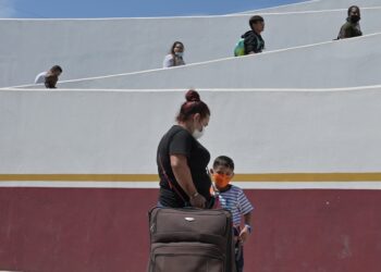 Migrants from Central America, Mexico and Haiti were given humanitarian parole in Tijuana to enter the United States on Wednesday, August 3, 2022.  The humanitarian parole is an exception to the Title 42 policy still in place and the Migrant Protection Protocols (MPP) or "Remain in Mexico" program, which was allowed to be dismantled by a US Supreme Court ruling on June 30 but the Biden Administration has not moved yet in replacing it or terminating the program because its reviewing how it will process migrants seeking asylum in the future---the Trump-era program forcing migrants to stay in Mexico will not change migrants circumstances due to Title 42 not allowing them to seek asylum at the U.S.-Mexico border or port of entries. (Photo by Carlos Moreno/Sipa USA) No Use Germany.