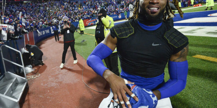 Buffalo Bills safety Damar Hamlin celebrates after an NFL football game against the New York Jets, Sunday, Jan. 9, 2022, in Orchard Park, N.Y. (AP Photo/Adrian Kraus)