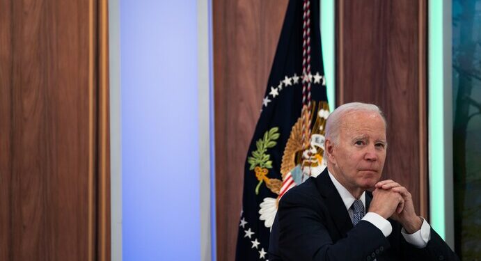 President Biden listens to a speaker at the Major Economies Forum on Energy and Climate in the White House complex Thursday. (Elizabeth Frantz/For The Washington Post)