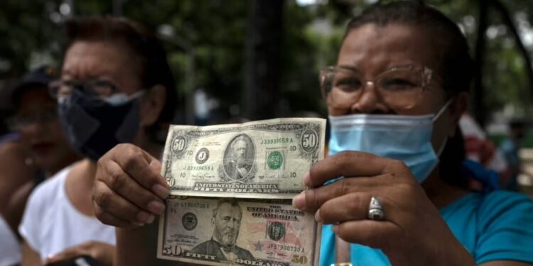 Dólar, Venezuela. Foto AP.