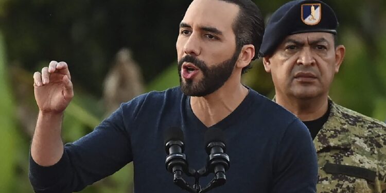 (FILES) El Salvador's President Nayib Bukele speaks before some 14,000 soldiers gathered in a field near a military barracks on the outskirts of the town of San Juan Opico, 35 km west of San Salvador, on November 23, 2022. Controversial El Salvador President Nayib Bukele claimed on May 11, 2023, that the Central American country known for its sky-high levels of violence has not recorded any murders in the last year. Just over a year ago, Bukele declared a "war" on organized criminal gangs and declared a state of emergency that allowed police to round up more than 68,000 suspected gang members without a warrant. (Photo by Marvin RECINOS / AFP)