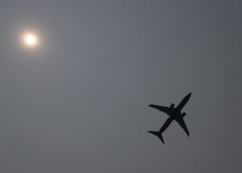 A Southwest Boeing 737 airplane takes off into a smoke haze from Ronald Reagan Washington National Airport in Arlington, Virginia, June 8, 2023, as smoke from wildfires in Canada blankets the area. Smoke from Canadian wildfires have shrouded the US East Coast in a record-breaking smog, forcing cities to issue air pollution warnings and thousands of Canadians to evacuate their homes. The devastating fires have displaced more than 20,000 people and scorched about 3.8 million hectares (9,390,005 acres) of land. Prime Minister Justin Trudeau described this wildfire season as the country's worst ever. (Photo by SAUL LOEB / AFP)