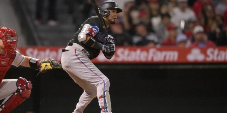 ANAHEIM, CALIFORNIA - MAY 27: Luis Arraez #3 of the Miami Marlins hits an RBI-single in the fifth inning against the Los Angeles Angels at Angel Stadium of Anaheim on May 27, 2023 in Anaheim, California.   Jayne Kamin-Oncea/Getty Images/AFP (Photo by Jayne Kamin-Oncea / GETTY IMAGES NORTH AMERICA / Getty Images via AFP)