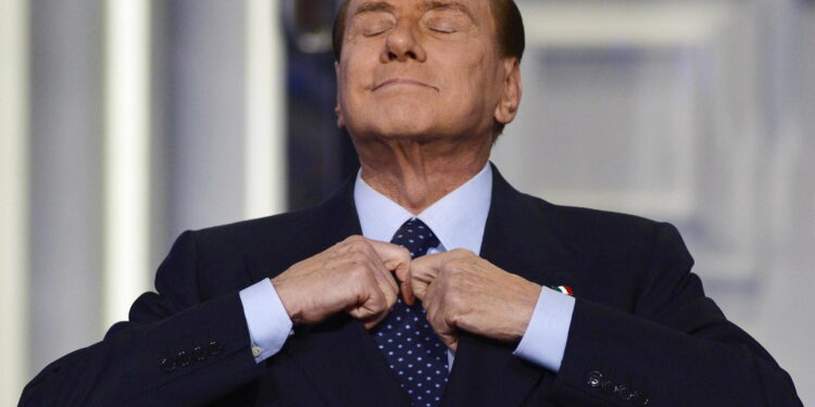 Rome (Italy), 18/12/2012.- (FILE) Former Italian Prime Minister Silvio Berlusconi adjusting his tie during the recording of the Italian Rai 1 television program 'Porta a porta', in Rome, Italy, 18 December 2012 (reissued 12 June 2023). Silvio Berlusconi has died at the age of 86 on 12 June 2023 at San Raffaele hospital in Milan, where he was hospitalized again since last 09 June, sources close to his family told ANSA. The Italian media tycoon and Forza Italia (FI) party founder served as prime minister of Italy in four governments. (Italia, Roma) EFE/EPA/GUIDO MONTANI *** Local Caption *** 51003898