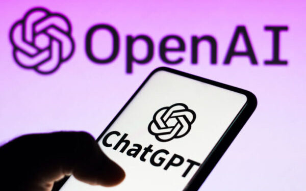 BRAZIL - 2023/04/05: In this photo illustration, the ChatGPT logo is seen displayed on a smartphone and the OpenAI company logo on background. (Photo Illustration by Rafael Henrique/SOPA Images/LightRocket via Getty Images)