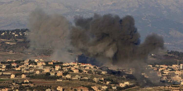 Smoke billows over the southern Lebanese village of Meiss El-Jabbal near the border with Israel following Israeli bombardment on December 26, 2023, amid ongoing cross-border tensions as fighting continues between Israel and Hamas militants in Gaza. (Photo by AFP)