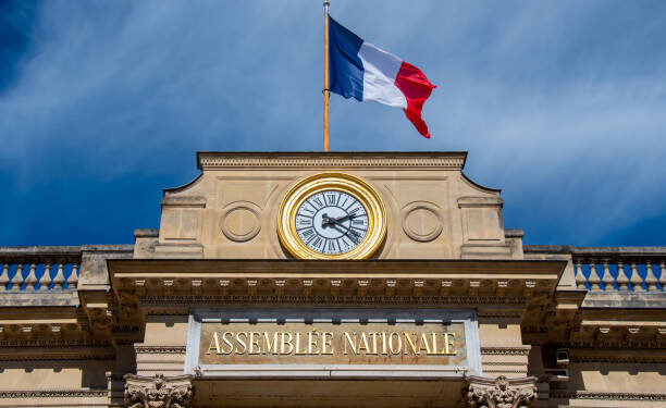 Detail of the facade of the French National Assembly building, also called Palais Bourbon or chamber of deputies, elected representatives in parliament by the people of France
