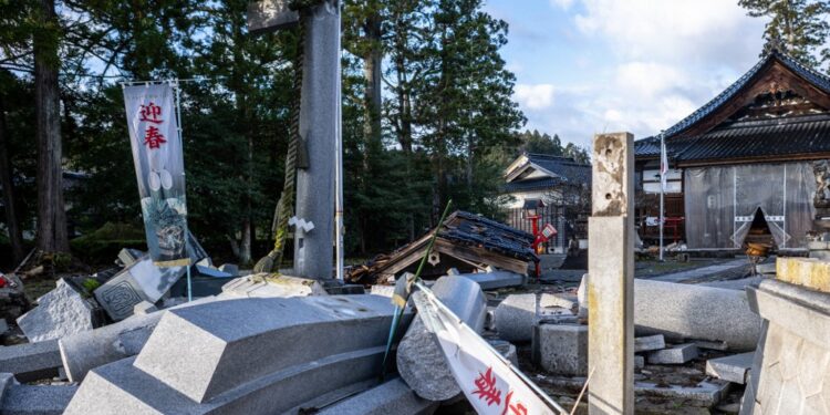 A collapsed shrine is pictured in the town of Anamizu, Ishikawa prefecture on January 5, 2024, after a major 7.5 magnitude earthquake struck the Noto region in Ishikawa prefecture on New Year's Day. Thousands of Japanese rescuers, some with sniffer dogs, on January 4 battled rubble and blocked roads as hopes faded for dozens listed as missing three days after the devastating earthquake that killed at least 84. (Photo by Philip FONG / AFP)