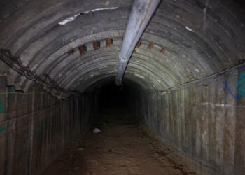 (FILES) This picture taken during a media tour organized by the Israeli military on December 15, 2023, shows a tunnel that Hamas reportedly used to attack Israel through the Erez border crossing on October 7. The Israeli army said on January 30, 2024 it is channelling water into Gaza's tunnels in a bid to destroy the sprawling underground network used by Hamas militants to launch attacks on Israel. (Photo by JACK GUEZ / AFP)
