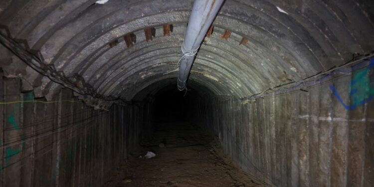 (FILES) This picture taken during a media tour organized by the Israeli military on December 15, 2023, shows a tunnel that Hamas reportedly used to attack Israel through the Erez border crossing on October 7. The Israeli army said on January 30, 2024 it is channelling water into Gaza's tunnels in a bid to destroy the sprawling underground network used by Hamas militants to launch attacks on Israel. (Photo by JACK GUEZ / AFP)