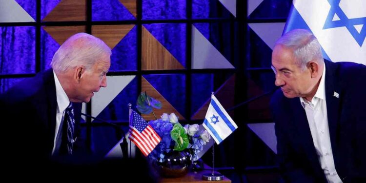 FILE PHOTO: U.S. President Joe Biden attends a meeting with Israeli Prime Minister Benjamin Netanyahu, as he visits Israel amid the ongoing conflict between Israel and Hamas, in Tel Aviv, Israel, October 18, 2023. REUTERS/Evelyn Hockstein/File Photo