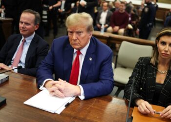 (FILES) Former US President Donald Trump sits in New York State Supreme Court during the civil fraud trial against the Trump Organization, in New York City on January 11, 2024. A US judge ordered Trump on February 16, 2024 to pay nearly $355 million after finding him liable for fraud and banned him from running businesses in New York state for three years. (Photo by Charly TRIBALLEAU / AFP)