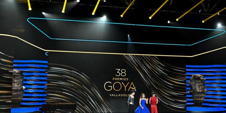 Spanish singer and actress Ana Belen and Spanish film directors Javier Calvo and Javier Ambrossi aka 'Los Javis' present the 38th Goya Awards ceremony in Valladolid, on February 10, 2024. (Photo by JAVIER SORIANO / AFP)