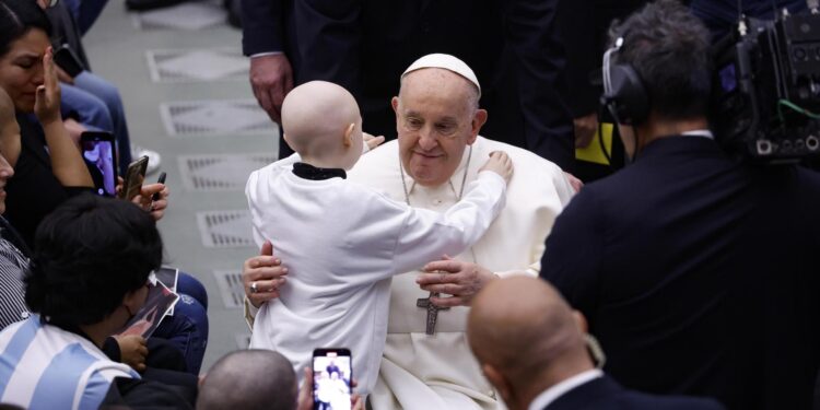 Vatican City (Vatican City State (holy See)), 16/03/2024.- Pope Francis hugs a child during a special audience with managers and staff of the Children's Hospital 'Bambino Gesu' at Paul VI Hall, Vatican City, 16 March 2024. (Papa) EFE/EPA/FABIO FRUSTACI