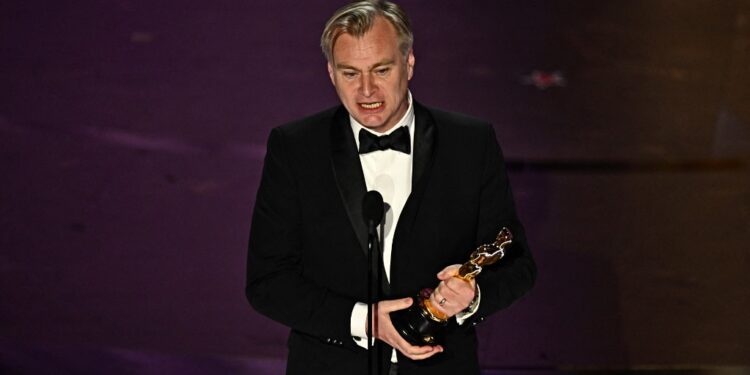 British director Christopher Nolan accepts the award for Best Director for "Oppenheimer" onstage during the 96th Annual Academy Awards at the Dolby Theatre in Hollywood, California on March 10, 2024. (Photo by Patrick T. Fallon / AFP)