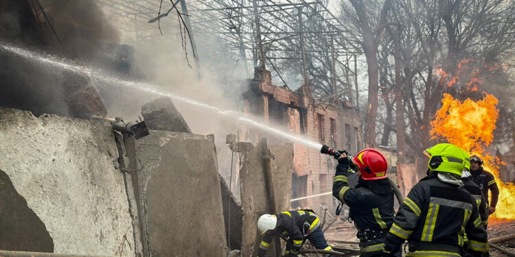 Firefighters work at the site of a Russian missile strike, amid Russia's attack on Ukraine, in Odesa, Ukraine March 15, 2024. Press service of the State Emergency Service of Ukraine in Odesa region/Handout via REUTERS ATTENTION EDITORS - THIS IMAGE HAS BEEN SUPPLIED BY A THIRD PARTY.