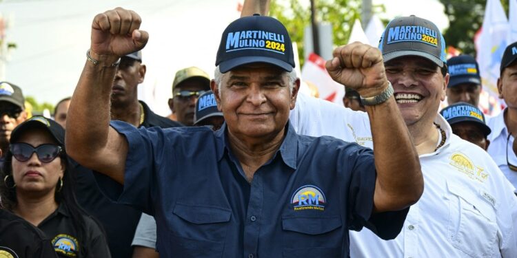 Panama's presidential candidate for the Realizando Metas party, Jose Raul Mulino, gestures during a campaign rally in Panama City on April 16, 2024. . Panama will hold presidential election next May 5, 2024. (Photo by MARTIN BERNETTI / AFP)