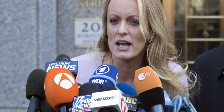 FILE - In this April 16, 2018, file photo, adult film actress Stormy Daniels speaks outside federal court, in New York. The mayor and members of the City Council in West Hollywood, Calif., will give the porn actress the Key to the City in a ceremony Wednesday, May 23, 2018, at the adult boutique Chi Chi LaRue's. (AP Photo/Mary Altaffer, File)