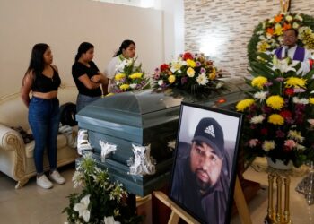 Family and friends of journalist Victor Jimenez, who disappeared in 2020, mourn his death during a mass after his remains were found in a well that was converted into a mass grave and transported by his relatives to Celaya, Guanajuato State, Mexico, for his funeral on June 12, 2024. (Photo by Mario ARMAS / AFP)