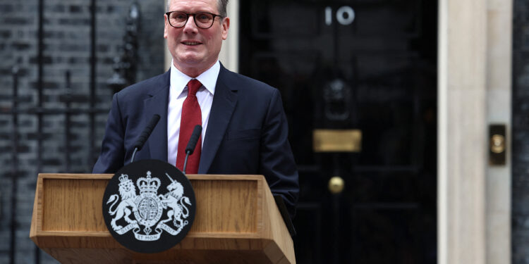 Britain's incoming Prime Minister Keir Starmer and leader of the Labour Party, addresses the nation after his general election victory, outside 10 Downing Street in London on July 5, 2024, a day after Britain held a general election. Starmer became Britain's new prime minister, as his centre-left opposition Labour party swept to a landslide general election victory, ending 14 years of right-wing Conservative rule. (Photo by HENRY NICHOLLS / AFP)