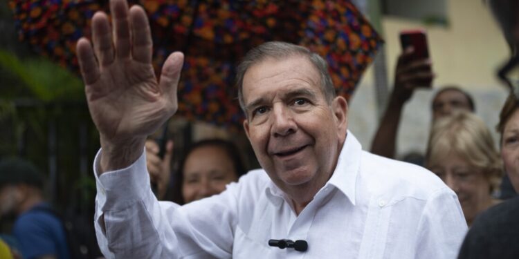 FILE - Venezuelan opposition presidential candidate Edmundo Gonzalez waves to supporters during a political event at a square in the Hatillo municipality of Caracas, Venezuela, June 19, 2024. (AP Photo/Ariana Cubillos, File)