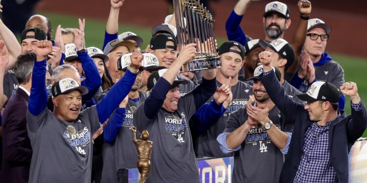 New York (United States), 31/10/2024.- Members of Los Angeles Dodgers celebrate with the trophy after defeating the New York Yankees during game five of the Major League Baseball (MLB) World Series between the American League Champion New York Yankees and the National League Champion Los Angeles Dodgers at Yankees Stadium in the Bronx borough of New York, New York, USA, 30 October 2024. The Dodgers won the best of seven games World Series 4-1. (Nueva York) EFE/EPA/SARAH YENESEL