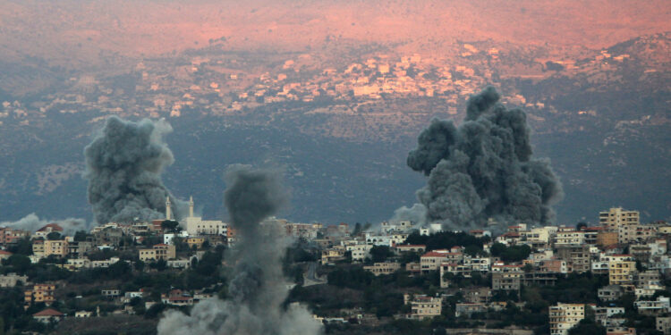 30 September 2024, Lebanon, Qliyaa: Heavy smoke of Israeli air raids billows from the southern Lebanese border town Khiam. Photo: Stringer/dpa (Photo by Stringer/picture alliance via Getty Images)