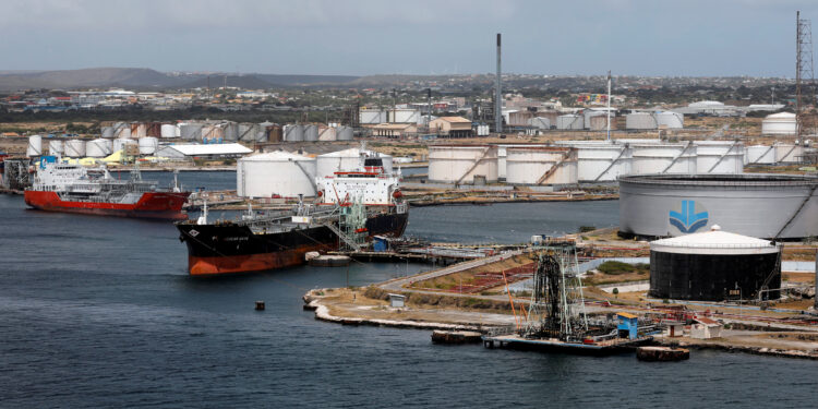 FILE PHOTO: Crude oil tankers are docked at Isla Oil Refinery PDVSA terminal in Willemstad on the island of Curacao, February 22, 2019. REUTERS/Henry Romero/File Photo