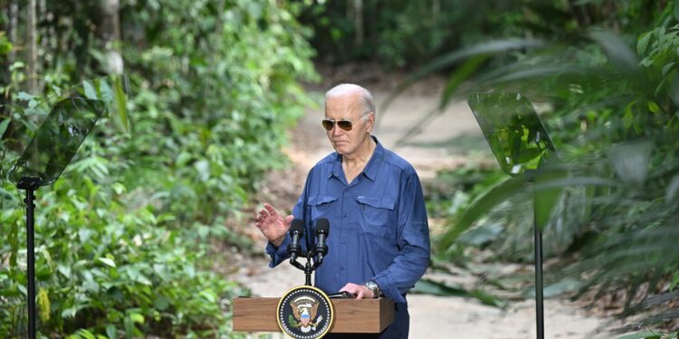 US President Joe Biden speaks after signing a proclamation designating November 17 as International Conservation Day during a tour of the Museu da Amazonia as he visits the Amazon Rainforest in Manaus, Brazil, on November 17, 2024, before heading to Rio de Janeiro for the G20 Summit. (Photo by SAUL LOEB / AFP)