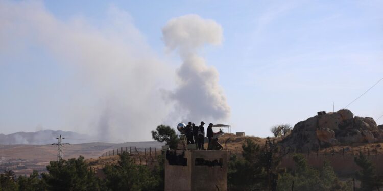 Damascus (Syrian Arab Republic), 09/12/2024.- Smoke billows following an Israeli airstrike near Sednaya prison, near Damascus, Syria, 09 December 2024. The Political Affairs Department of the Syrian Salvation Government said 30,000 prisoners have been released so far from only the first floor of Sednaya prison in Damascus. Rescue efforts continue to find prisoners. Syrian rebels entered Damascus on 08 December 2024 and announced in a televised statement the 'Liberation of the city of Damascus and the overthrow of Bashar al-Assad', as well as the release of all the prisoners. (Siria, Damasco) EFE/EPA/MOHAMMED AL RIFAI