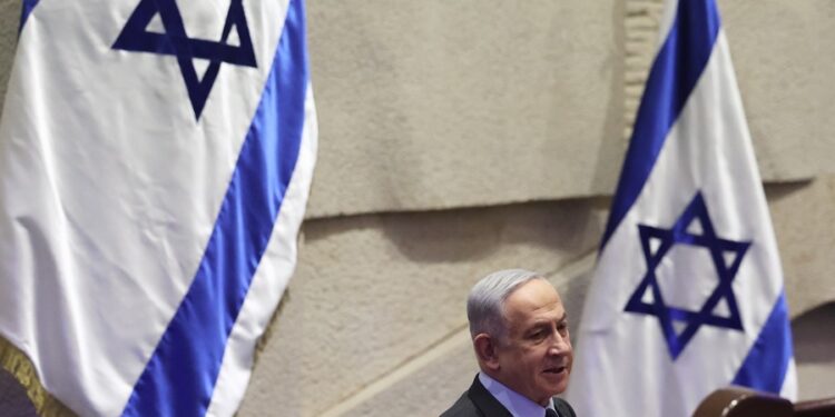 Jerusalem (Ó-), 19/02/2024.- Israeli Prime Minister Benjamin Netanyahu speaks during the voting session for the impeachment of Hadash-Taíal party MP Ofer Cassif in Jerusalem, 19 February 2024. The motion was brought up after Cassif publicly supported South Africaís genocide case against Israel at the International Court of Justice (ICJ). (Sudáfrica, Jerusalén) EFE/EPA/ABIR SULTAN