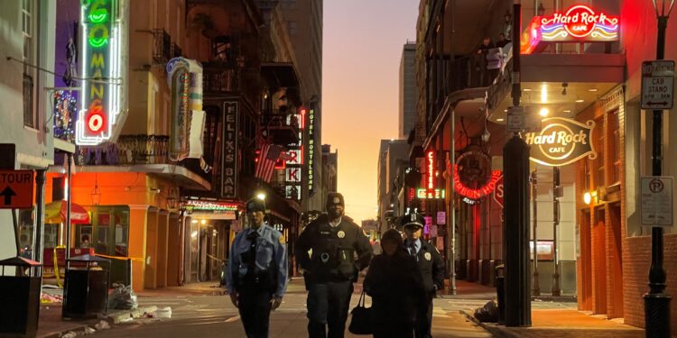 Police cordon off the area around the site of the overnight attack in the French Quarter of New Orleans, Louisiana, on January 1, 2025. - At least 10 people were killed and 30 injured Wednesday when a vehicle plowed overnight into a New year's crowd in the heart of the thriving New Orleans tourist district, authorities in the southern US city said. (Photo by Matthew HINTON / AFP)