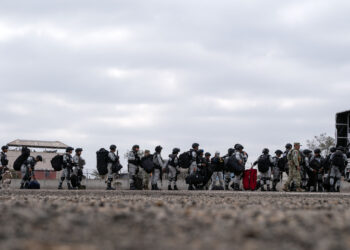 Mexico's National Guard officers arrive at Military Air Base No. 12 in Tijuana International Airport in Tijuana, Baja California state, Mexico, on February 4, 2025. Mexico began the 10,000-strong border troop deployment it had promised US President Donald Trump in exchange for delaying a 25-percent tariff on exported goods, President Claudia Sheinbaum said. (Photo by Guillermo Arias / AFP)